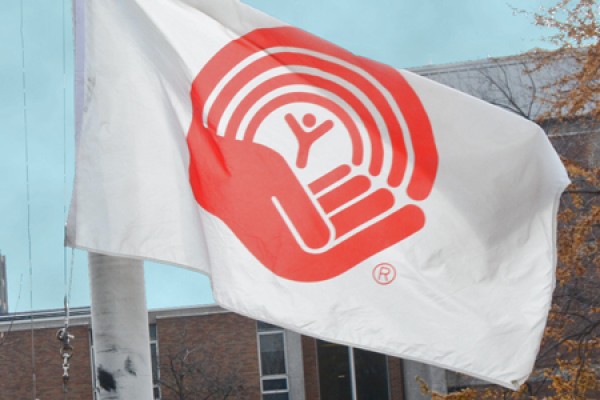 UWindsor president Alan Wildeman will raise the United Way flag over campus, Tuesday at noon outside Chrysler Hall Tower.
