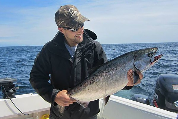 Mitch Dender holding a salmon