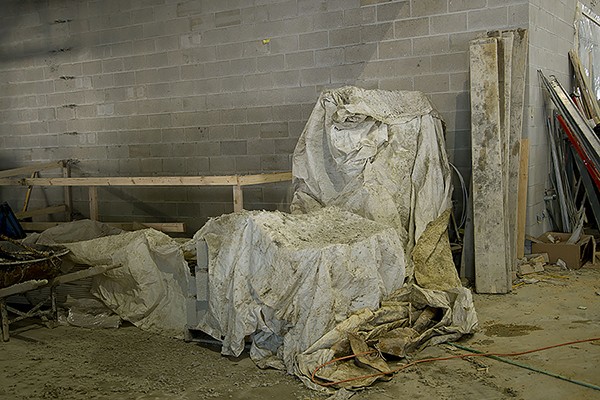 “Room with tarped forms (2013)”