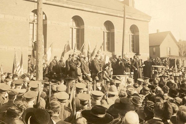 A thanksgiving service celebrates Peace with Victory, November 11, 1918, outside the downtown Armouries.
