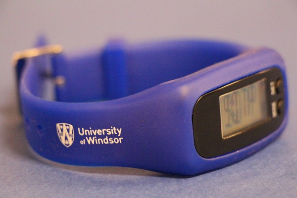 watch-pedometer with the UWindsor logo on its wristband