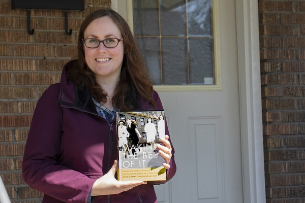 Sarah Glassford holding her book
