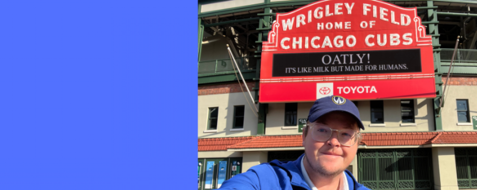 Mike Sonne standing in front entrance to Wrigley Field in Chicago