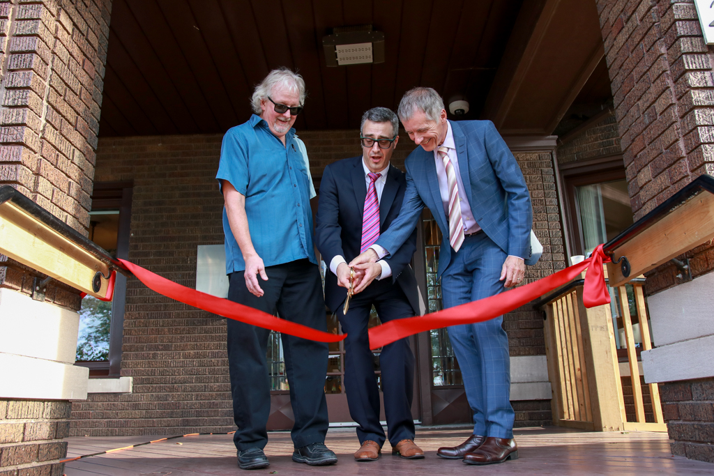 UWindsor Psychology Department Head Dennis Jackson, PSRC Director Antonio Pascual-Leone and UWindsor President Alan Wildeman cut  the ribbon at the grand opening of the Psychological Services and Research Centre on Sept. 21, 2017.